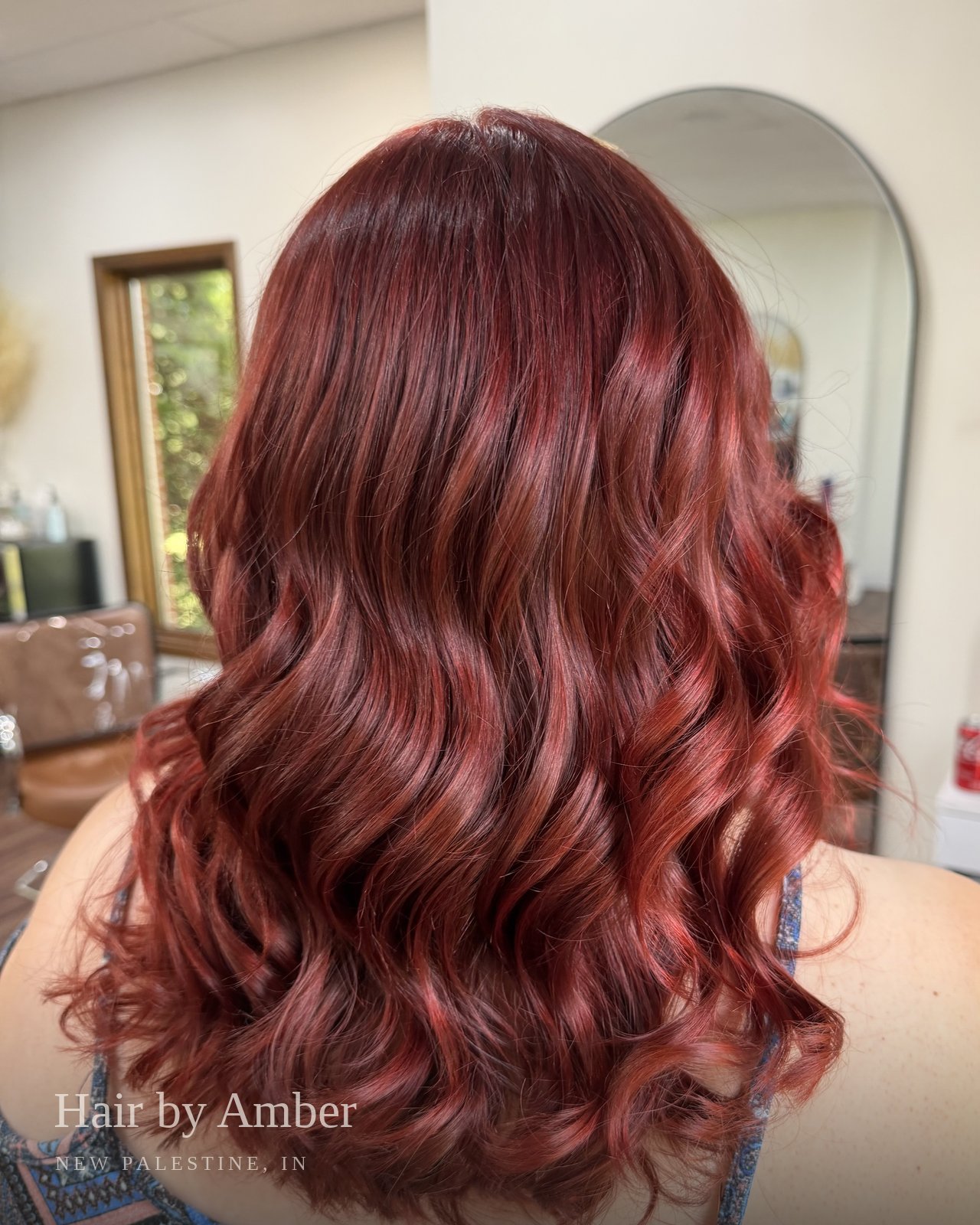 Hair by Amber — rich red, styled waves