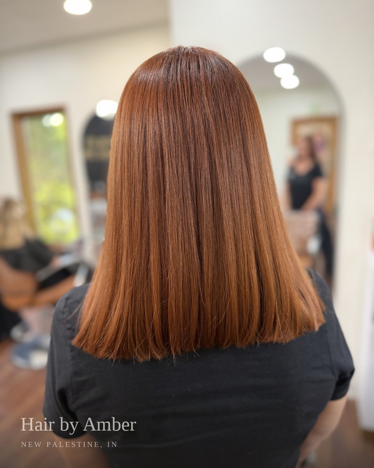 Hair by Amber — copper colour, sleek blunt finish