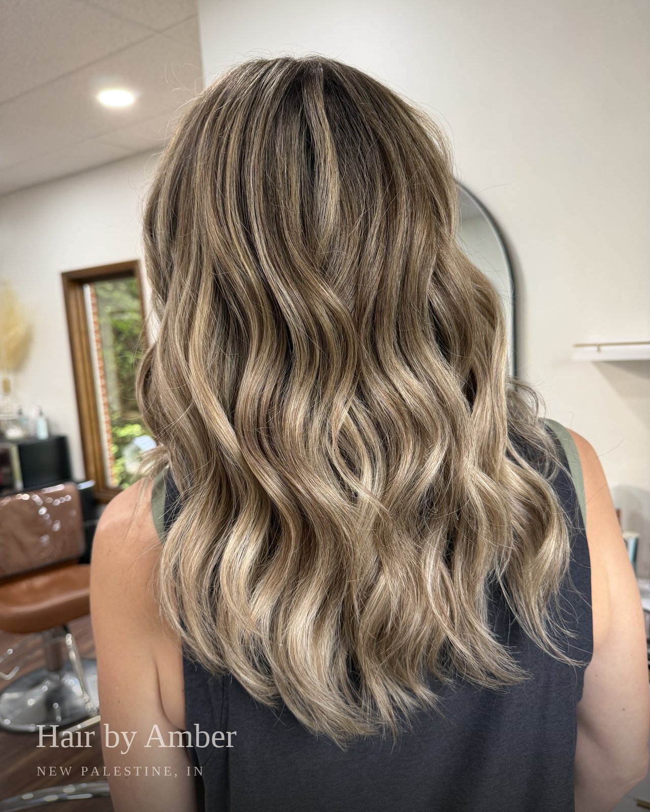 Hair by Amber — soft blonde balayage, beach waves